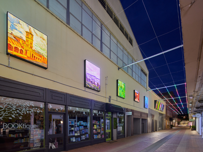 Lightboxes lit up in AMP Lane