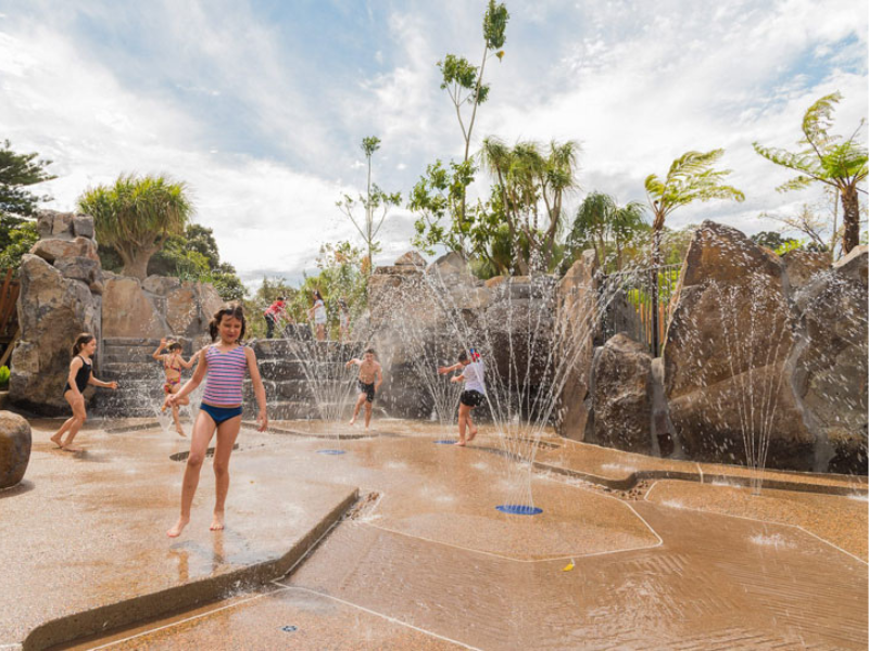 Children playing in a splash park