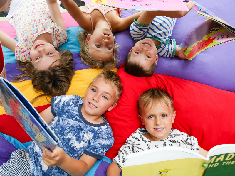 Kids in Library reading books