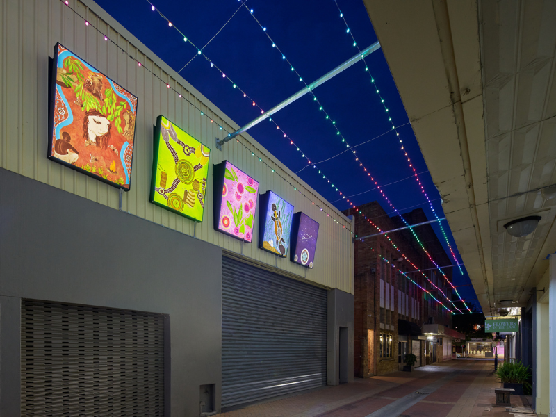 Lightboxes lit up in AMP Lane