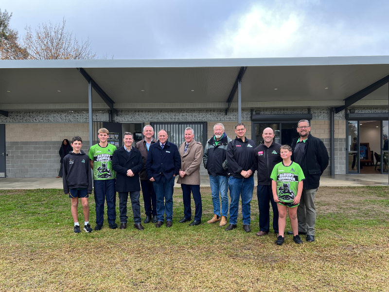 Albury Thunder Rugby League Club and government representatives with redeveloped Sarvaas Park sports pavilion in background